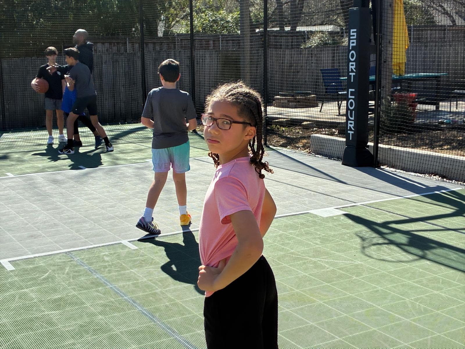Young player training on Coach T's court